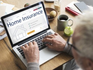 home-insurance-concept-laptop